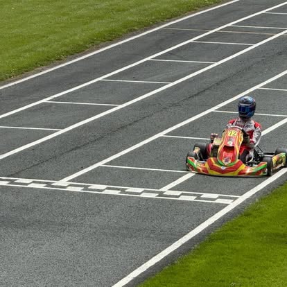 TLR kart crossing the finish line