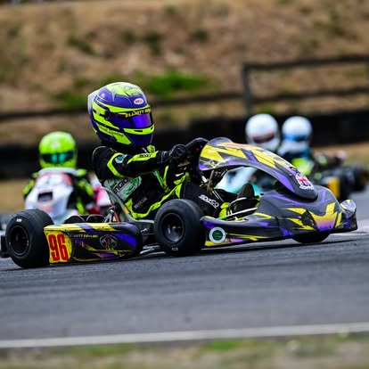 TLR kart 96 leading a pack on track