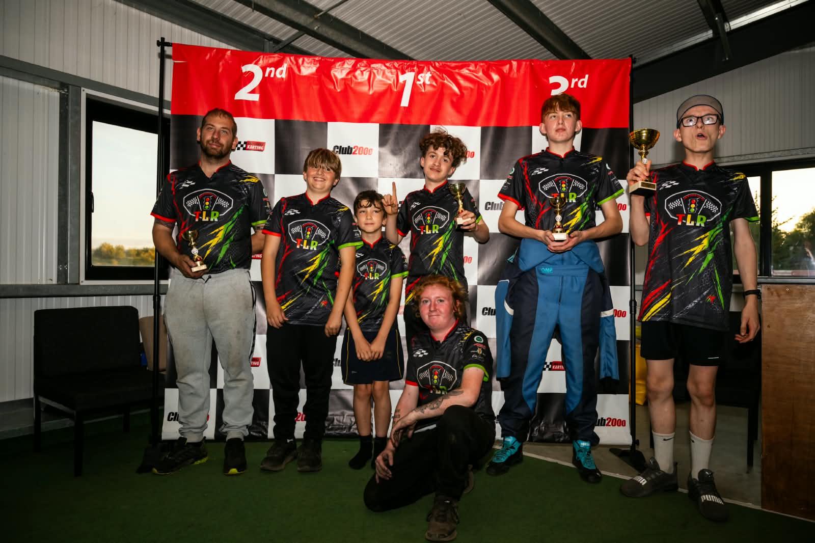 Trafficlight Racing team members with trophies at Red Lodge Kart Track