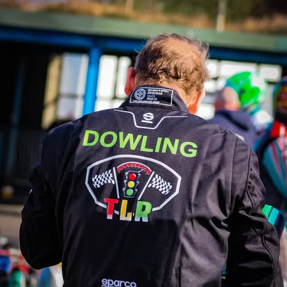 Back of the TLR Dowling race suit in the paddock